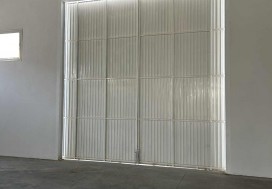 A LOUER LOCAL 1728/3360 M2 NEUF TU OUEST